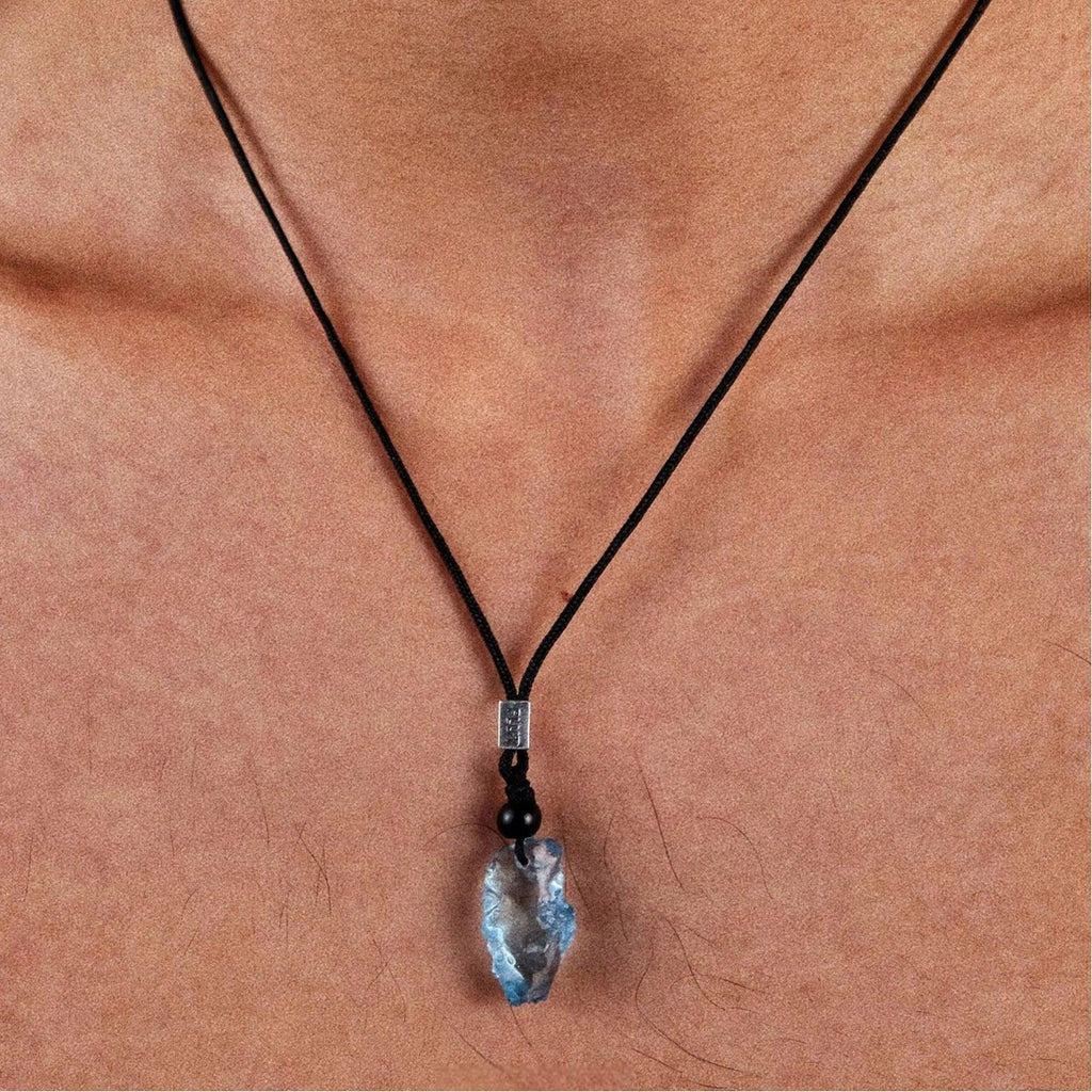 Raw Aquamarine Cord Pendant Necklace worn at the neckline from a second angle