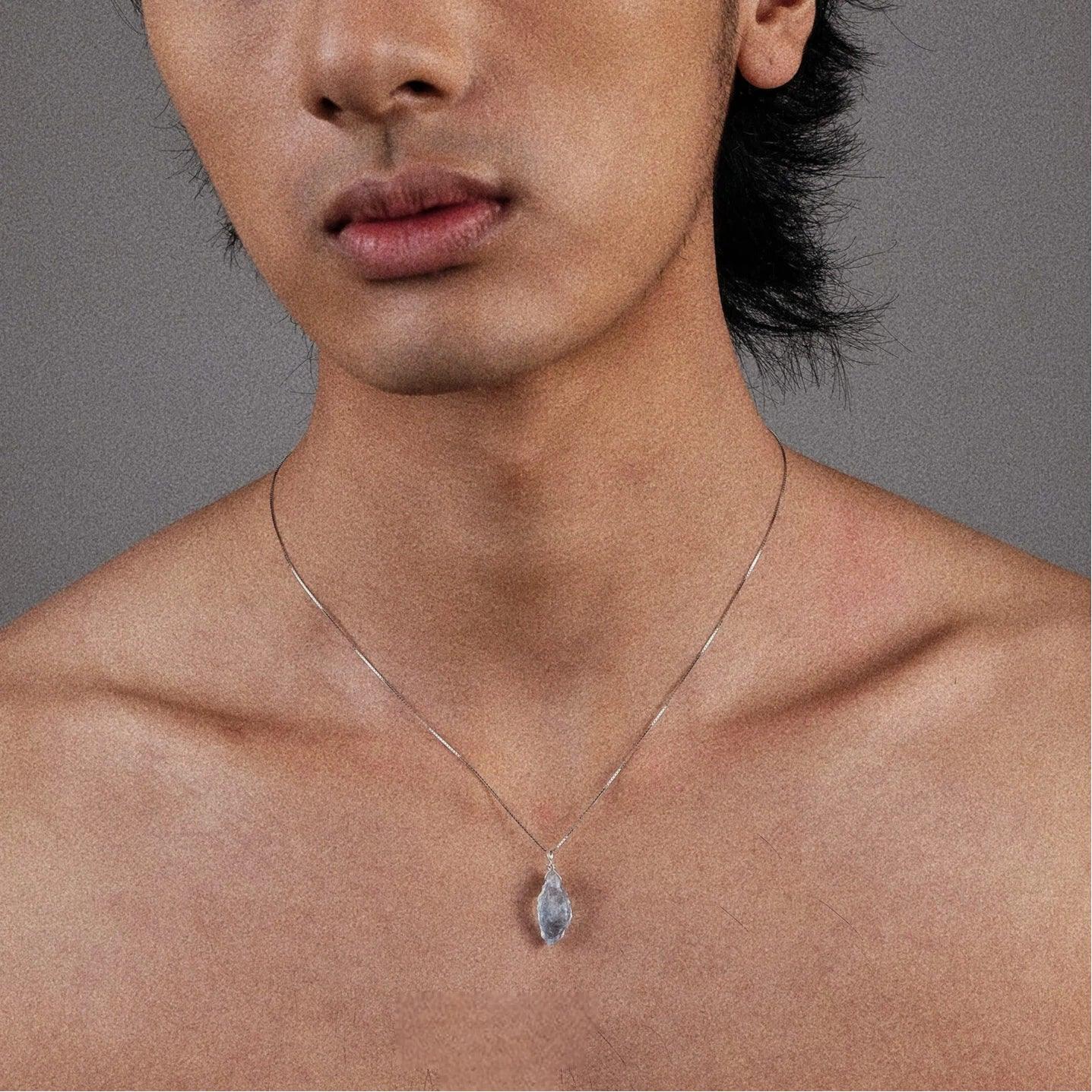 Raw Aquamarine Pendant Necklace worn at the neckline from a second angle