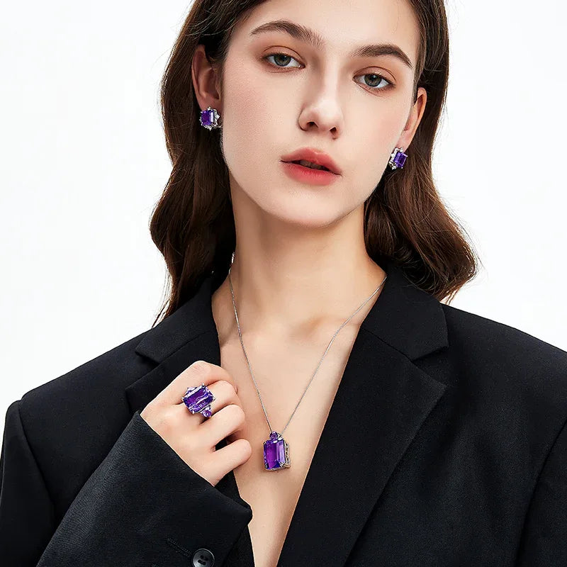 rectangular amethyst accent ring styled portrait showing the ring for scale