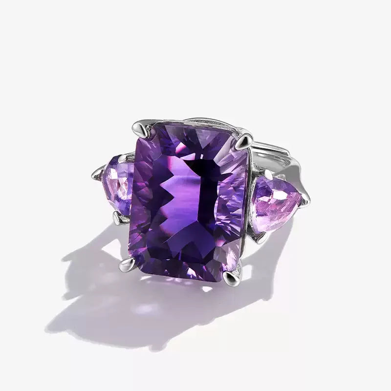 rectangular amethyst accent ring worn detail beside the face