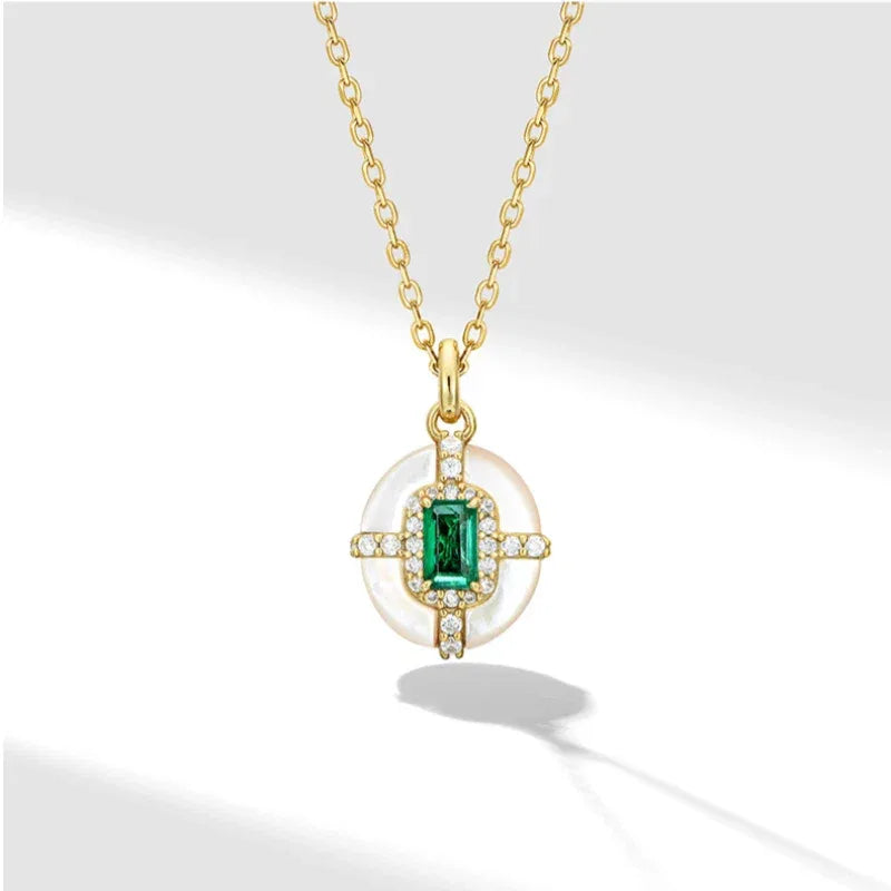 Rectangular Emerald Cross Pendant Necklace angled pendant detail