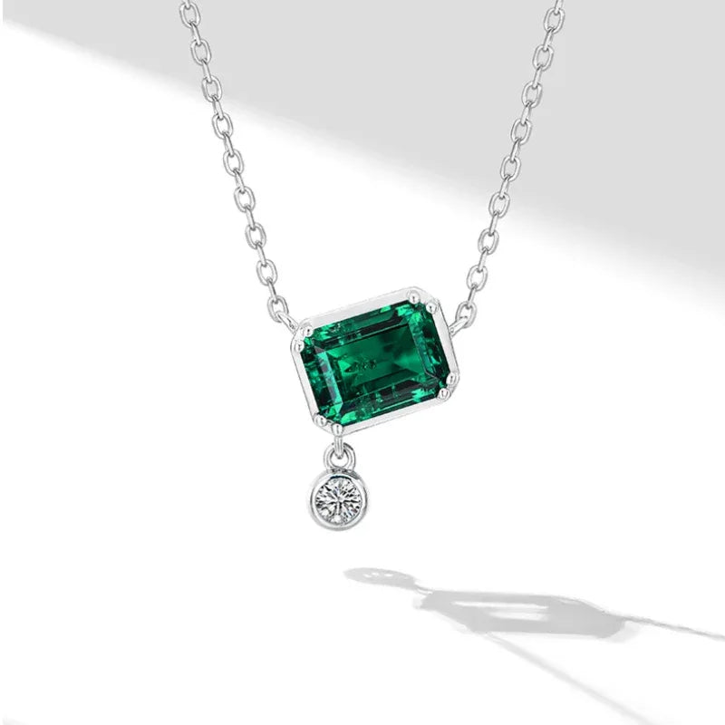 Rectangular Emerald Drop Pendant Necklace angled pendant detail