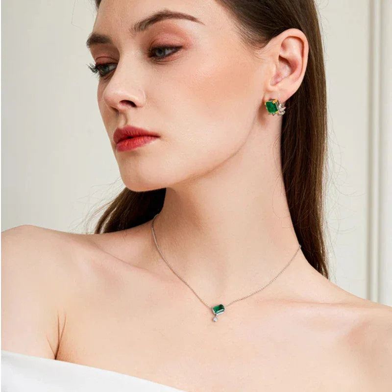Rectangular Emerald Drop Pendant Necklace worn at the neckline from a second angle