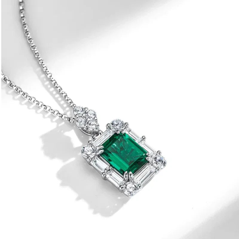 Rectangular Emerald Geometric Halo Necklace pendant and chain detail on white