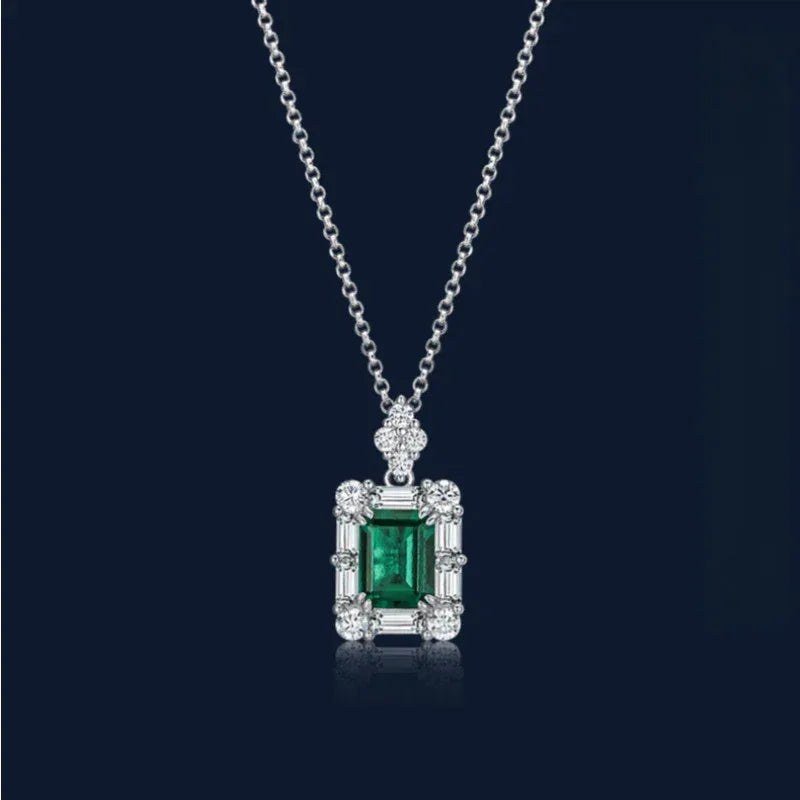 Rectangular Emerald Geometric Halo Necklace pendant view on a dark background