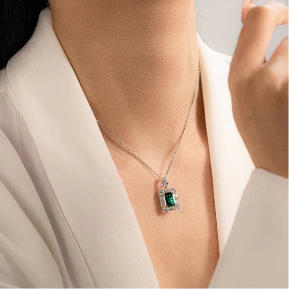 Rectangular Emerald Geometric Halo Necklace worn at the neckline from a second angle
