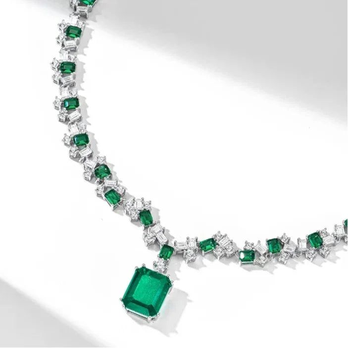 Rectangular Emerald Graduated Tennis Necklace pendant and chain detail on white