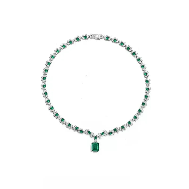 Rectangular Emerald Graduated Tennis Necklace pendant view on a dark background