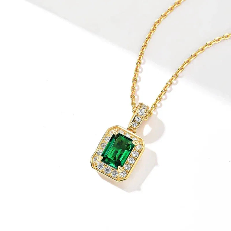 Rectangular Emerald Halo Pendant Necklace angled pendant detail