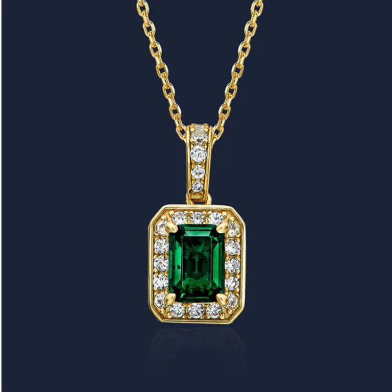 Rectangular Emerald Halo Pendant Necklace pendant view on a dark background