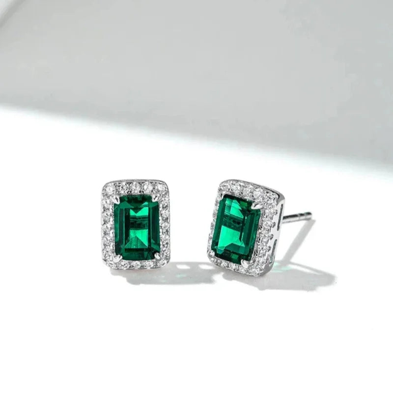 Rectangular Emerald Halo Stud Earrings side view showing posts and settings