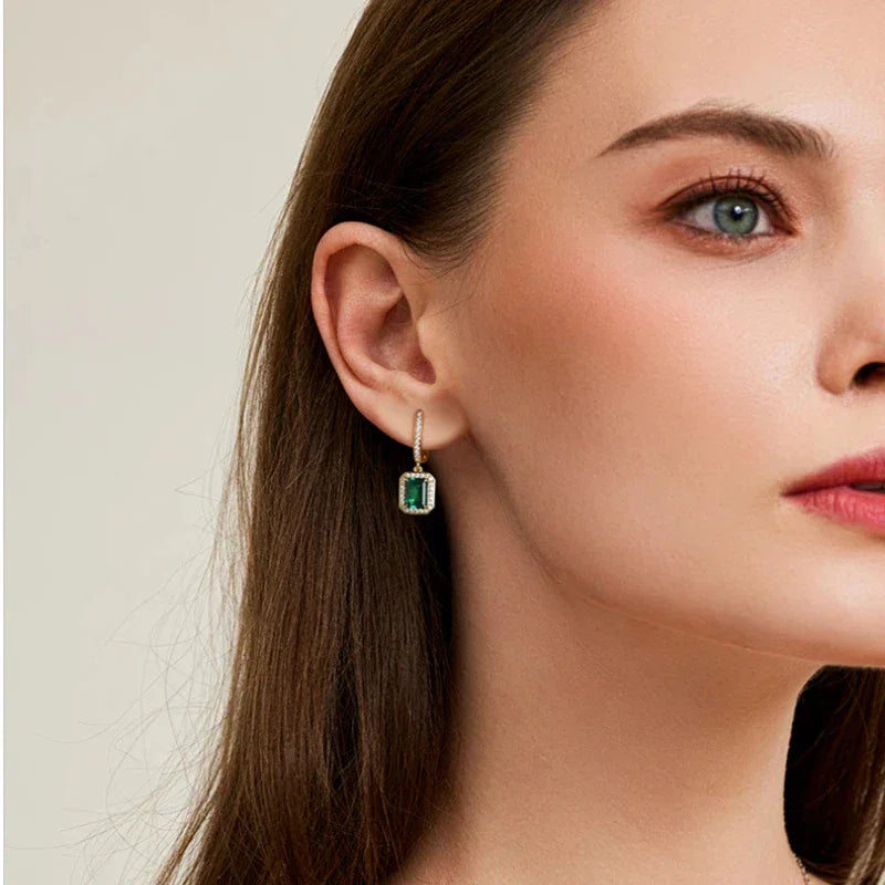 Rectangular Emerald Long Drop Earrings styled ear view showing scale