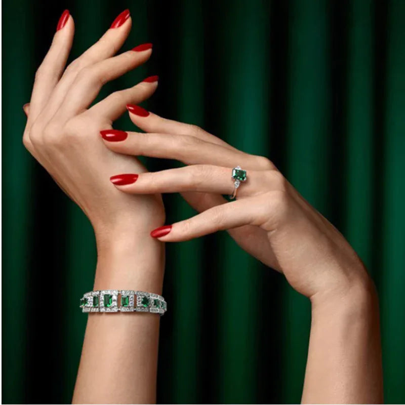 Rectangular Emerald Tennis Bracelet worn on the wrist from a second angle