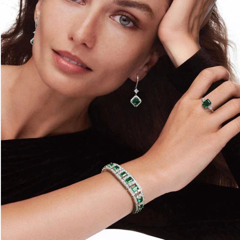 Rectangular Emerald Tennis Bracelet worn on the wrist in a close-up