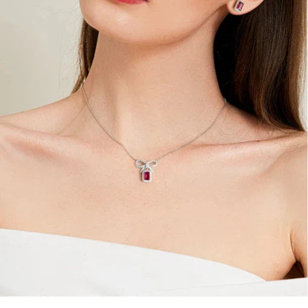Rectangular Ruby Bow Pendant Necklace — necklace worn at neckline