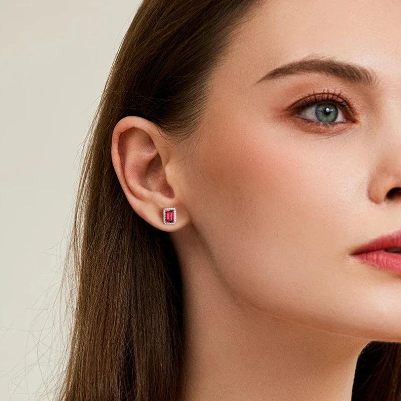 Rectangular Ruby Halo Stud Earrings — earrings worn on ear