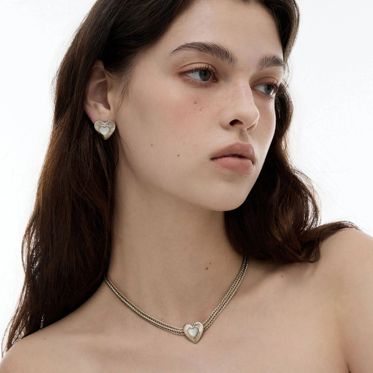Double-Chain Pearl Heart Necklace — side portrait wearing the necklace
