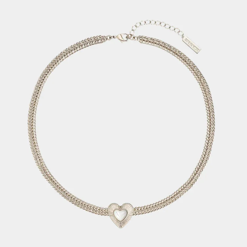 Double-Chain Pearl Heart Necklace — front view of double gold-tone chain necklace with a pearl heart center