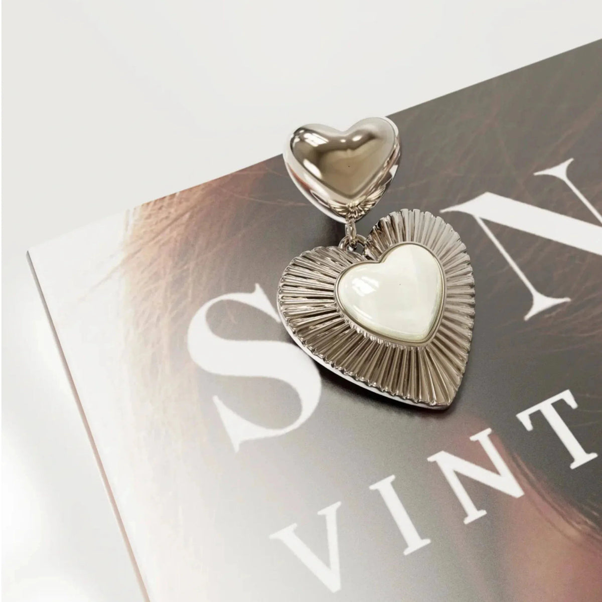 Double-Chain Pearl Heart Necklace — coordinated front-and-back heart pendant display