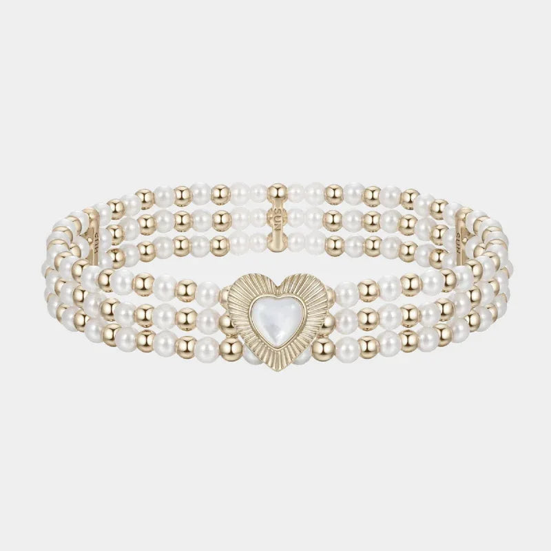 Multi-Row Pearl Heart Stretch Bracelet — front view of wide multi-row pearl bracelet with a heart centerpiece