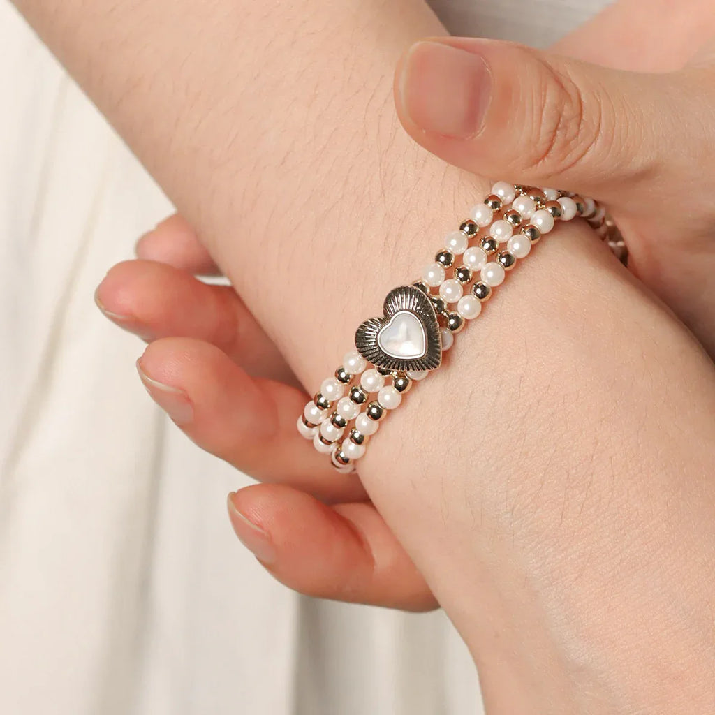 Multi-Row Pearl Heart Stretch Bracelet — wrist-worn close-up showing the bracelet width