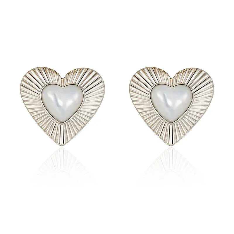 Ridged Pearl Heart Stud Earrings — alternate isolated front pair