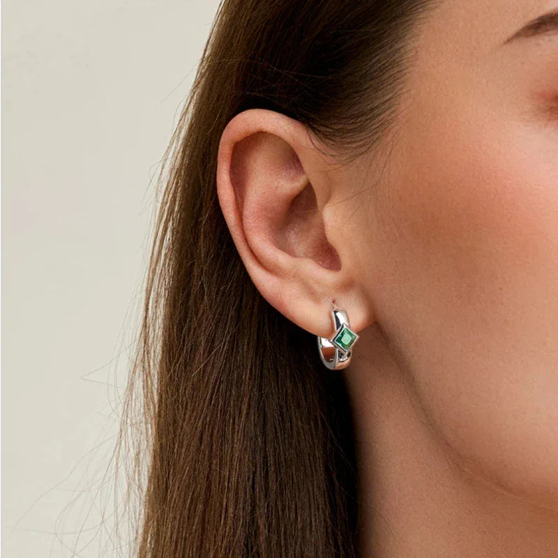 Rhombus Emerald Huggie Hoop Earrings styled ear view showing scale