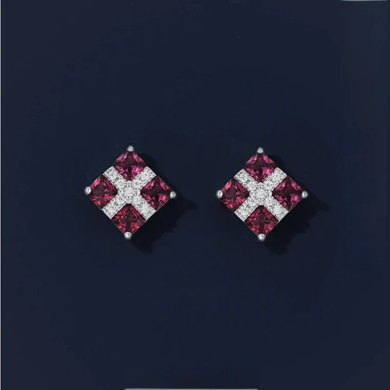 Rose-Purple Garnet Geometric Stud Earrings angled product detail on a jewelry display