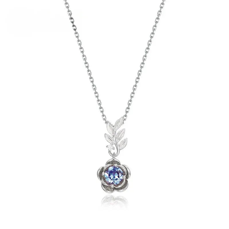 Round Alexandrite rose pendant necklace with a leaf connector, front product view on a white background