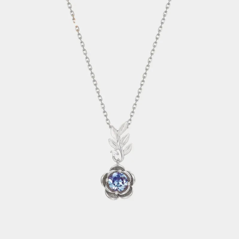 Round Alexandrite rose pendant necklace with a leaf connector, full product view on a white background