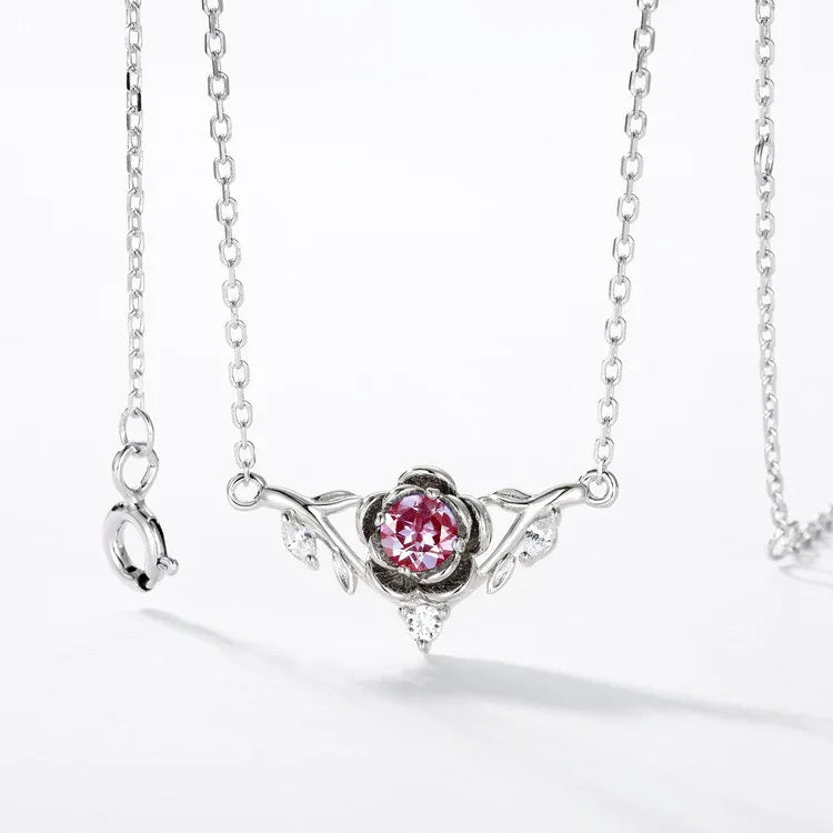 Round Alexandrite wing collar necklace, pink-toned Alexandrite view under alternate lighting