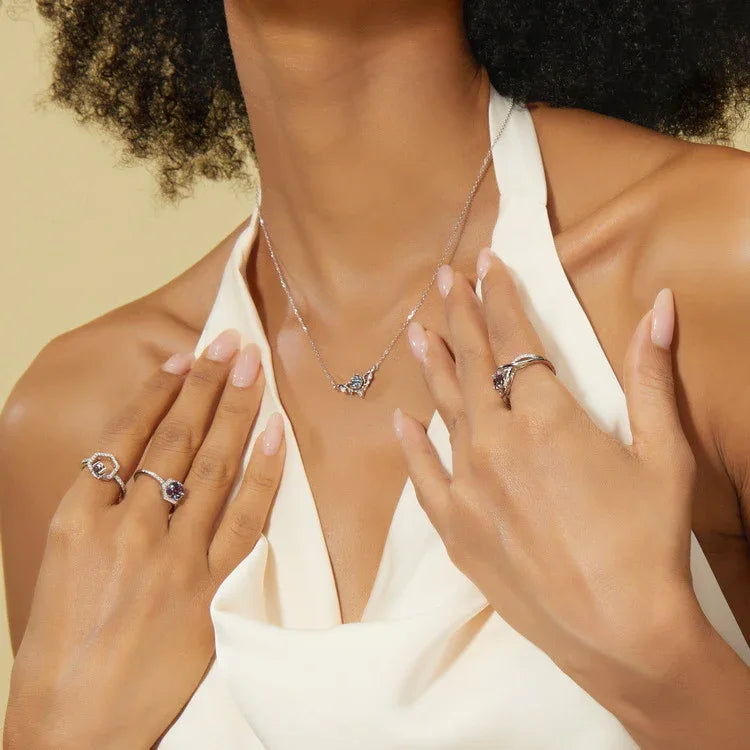 Round Alexandrite wing collar necklace, shown worn by a model for scale