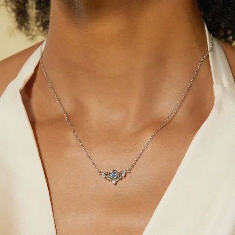 Round Alexandrite wing collar necklace, shown worn in a close lifestyle view