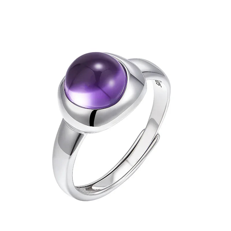 round amethyst bezel ring angled product view on a white background