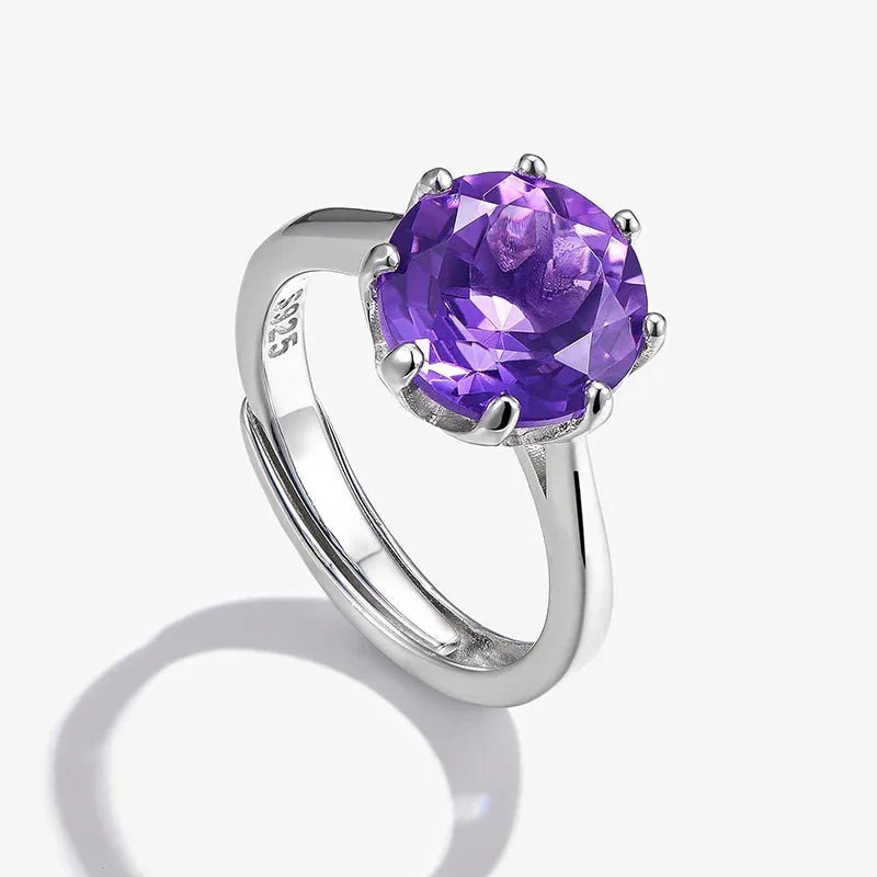 round amethyst solitaire ring angled product view on a white background