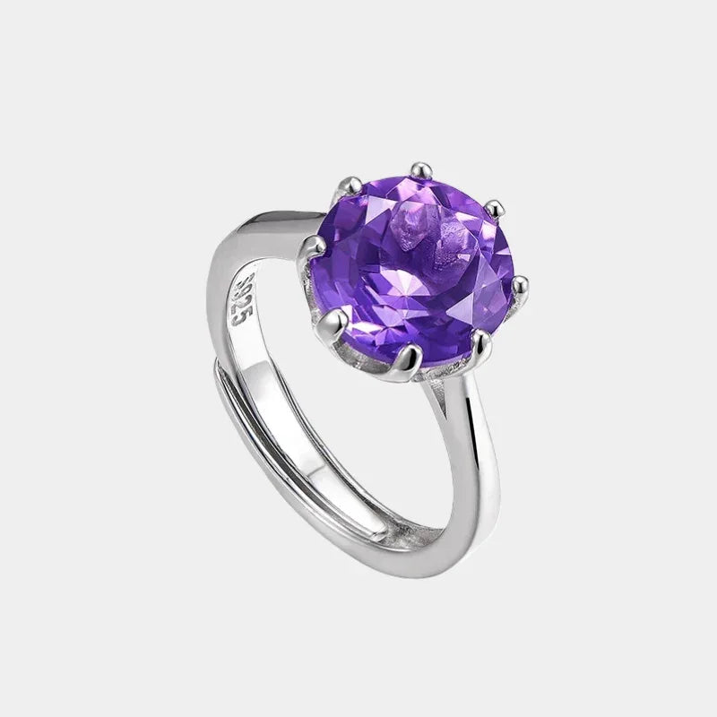 round amethyst solitaire ring front product view on a white background