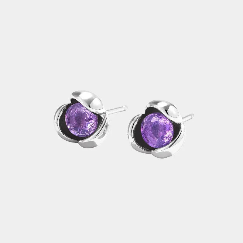 round amethyst stud earrings front product view on a white background