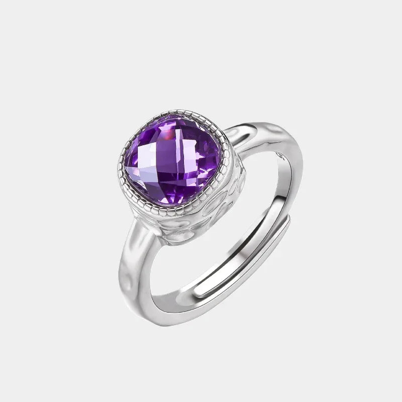 round amethyst halo ring front product view on a white background