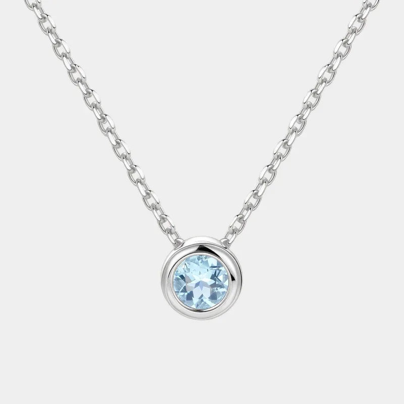 Round Aquamarine Bezel Pendant Necklace full necklace view on a white background