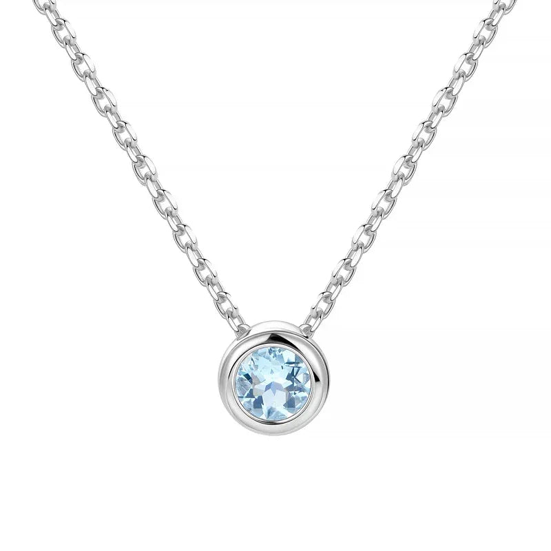 Round Aquamarine Bezel Pendant Necklace pendant and chain detail on a light background