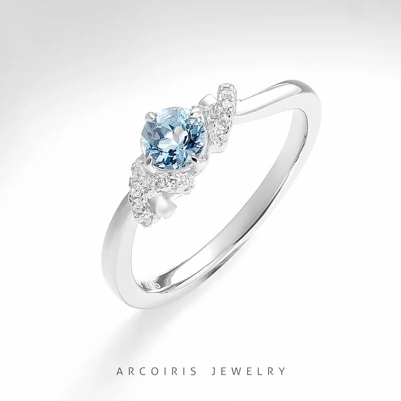 Round Aquamarine Floral Accent Ring styled hand view showing ring scale