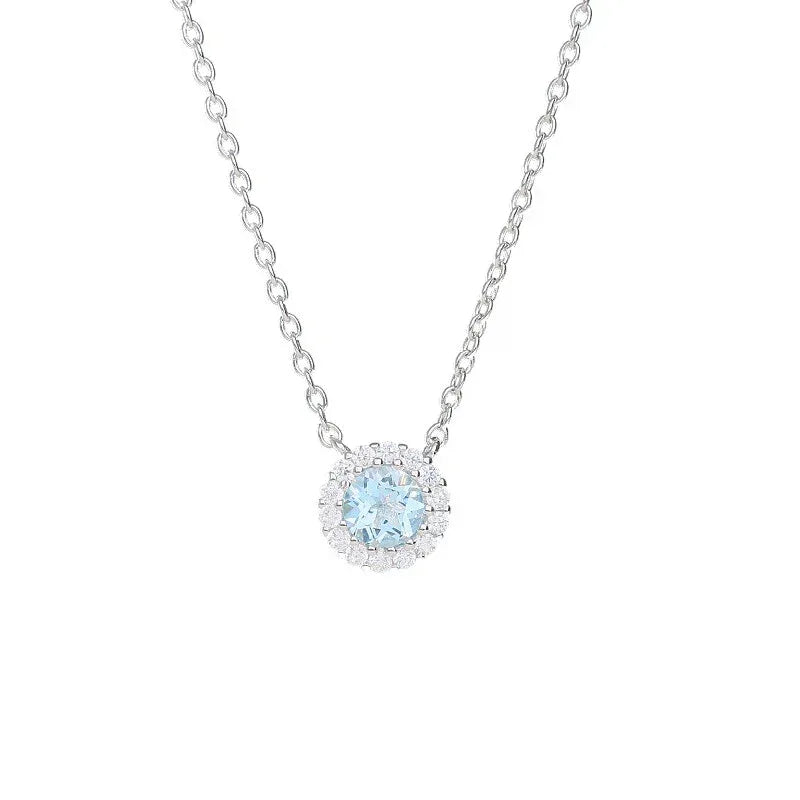 Round Aquamarine Halo Pendant Necklace angled pendant detail on white