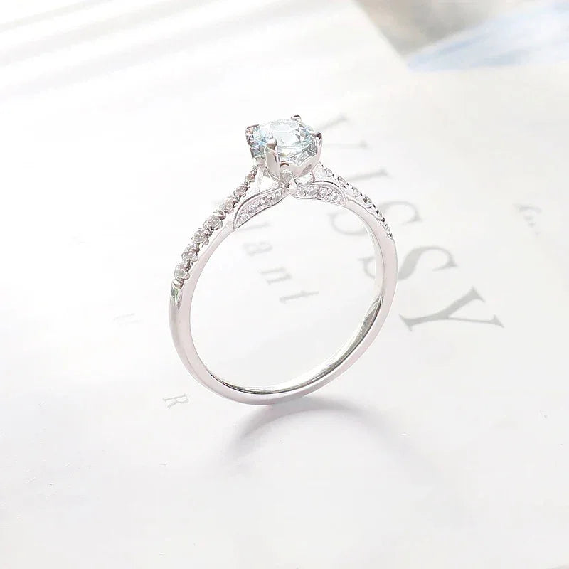 Round Aquamarine Pave Ring angled product view showing the setting