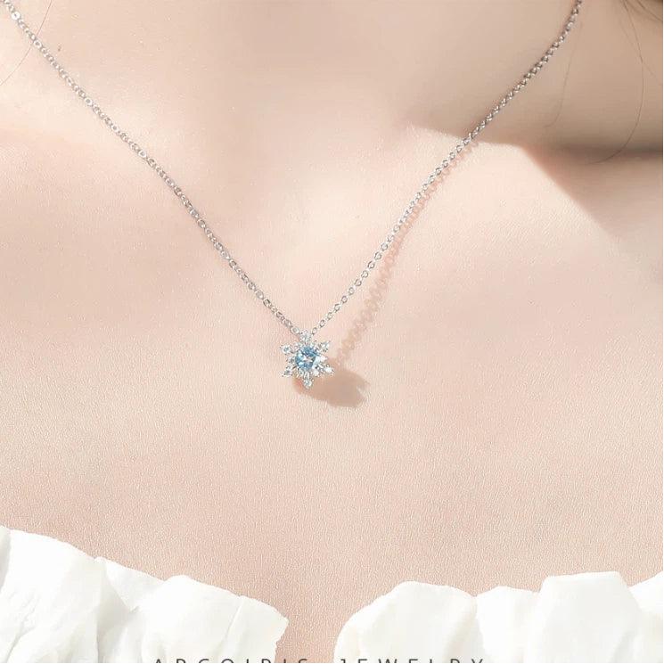 Round Aquamarine Snowflake Pendant Necklace styled neckline view showing pendant scale