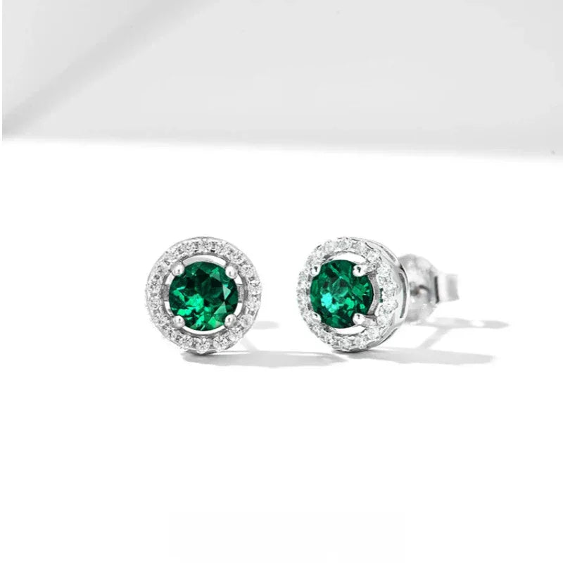 Round Emerald Halo Stud Earrings side view showing posts and settings