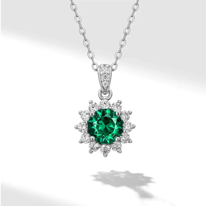 Round Emerald Sunflower Pendant Necklace pendant and chain detail on white
