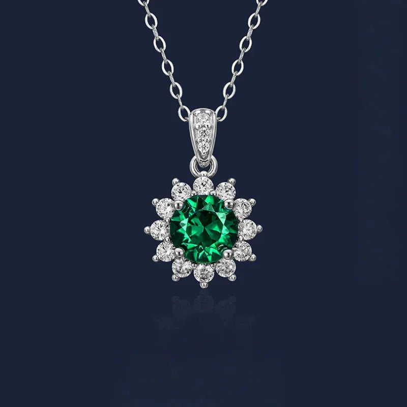Round Emerald Sunflower Pendant Necklace pendant view on a dark background