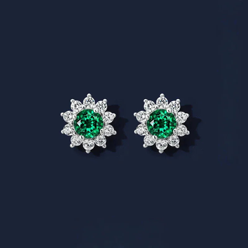 Round Emerald Sunflower Stud Earrings paired product view on a dark background