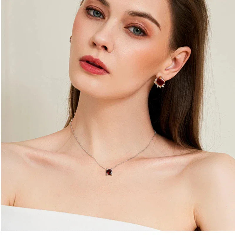 Round Garnet Bar-Set Pendant Necklace worn at the neckline from a second angle