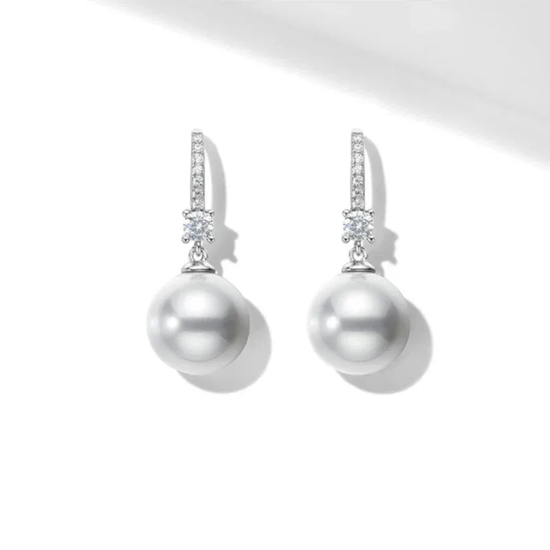 Pearl Drop Earrings with Floral Connector — front pair on white